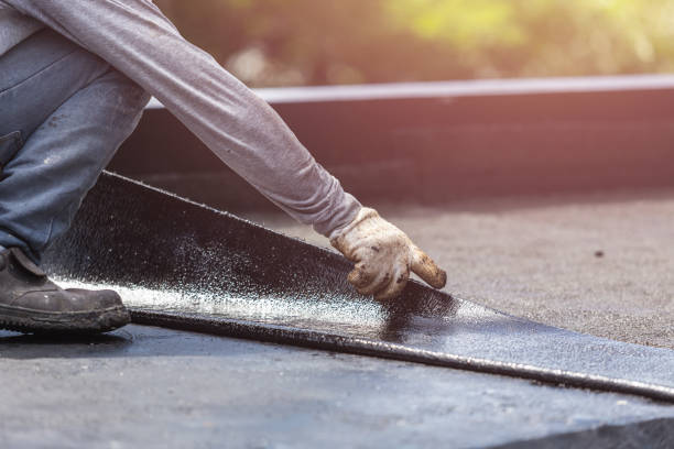 Professional Waterproofing technician working in Woodville, WI